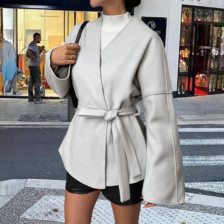 Women’s light wrap coat with tie belt, dropped sleeves and feminine waist emphasis Mune Fashion