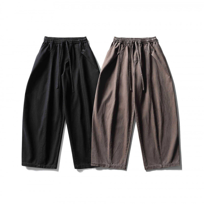Unisex wide balloon pants made of cotton blend with drawstring waistband and decorative darts Mune Fashion
