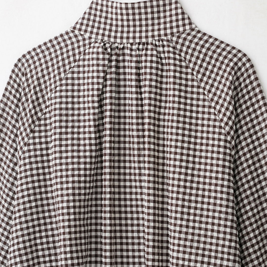 Women’s check blouse with stand-up collar, button closure and drawstring hem Mune Fashion