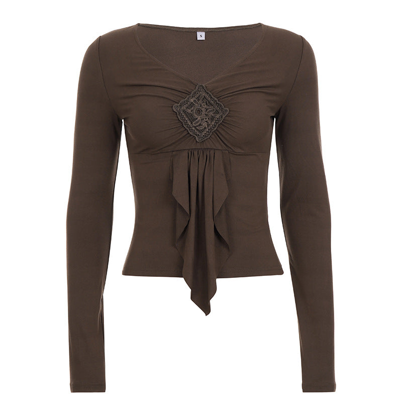 Women's figure-hugging long sleeve shirt with draped front and crocheted central applique Mune Fashion