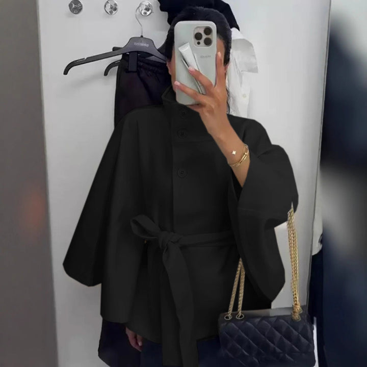 Ladies oversized cape jacket with stand-up collar, concealed button placket and belt Mune Fashion