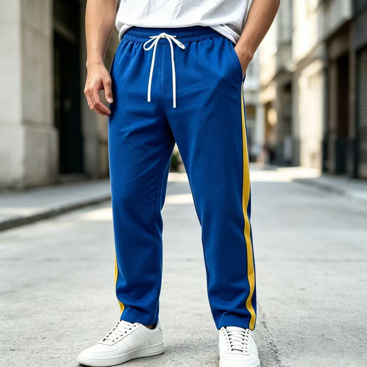 Men's jogging pants with side contrast stripe, elastic waistband and drawstring Mune Fashion