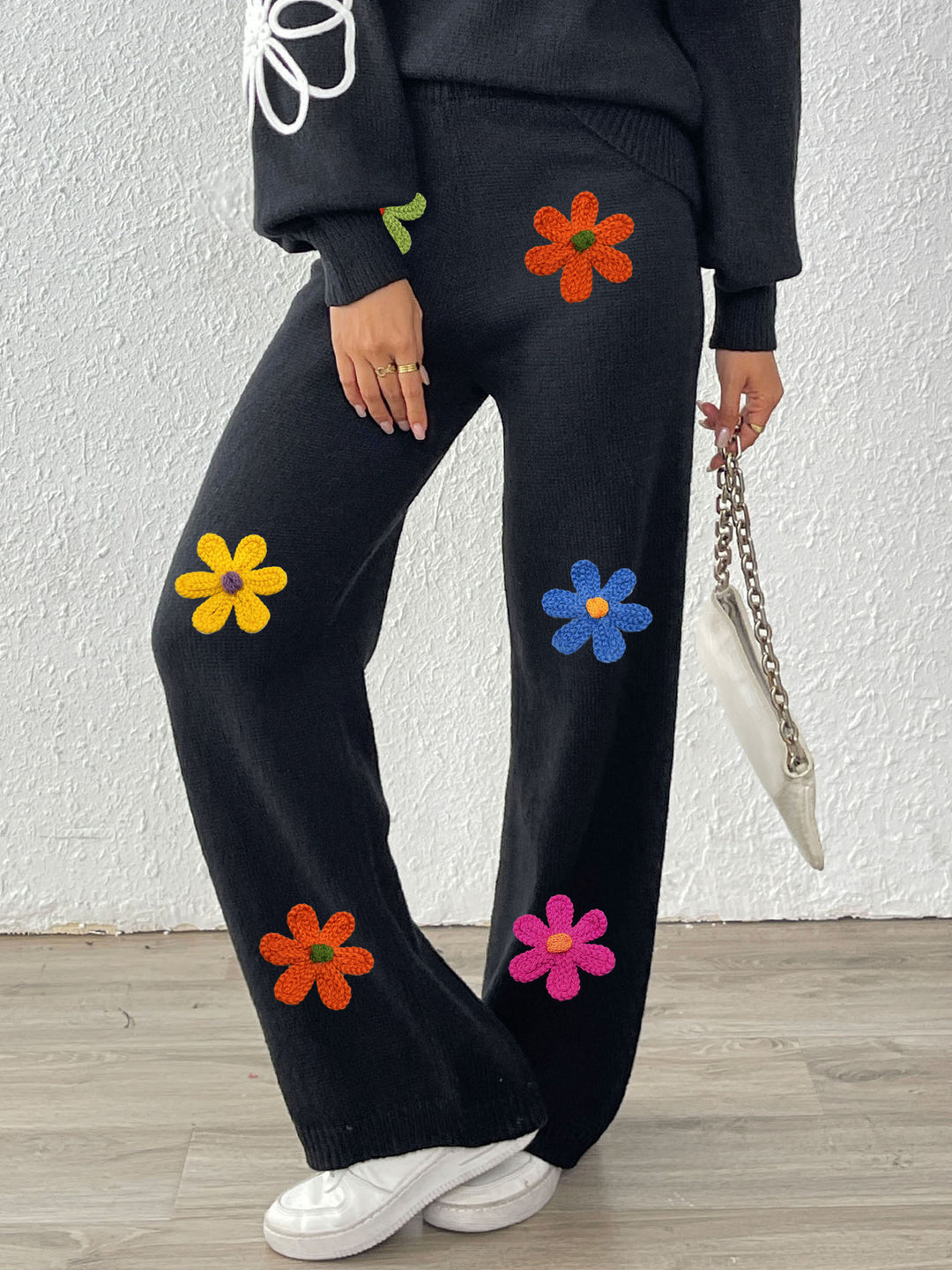 Women's casual knit pants with colorful floral appliqués Mune Fashion
