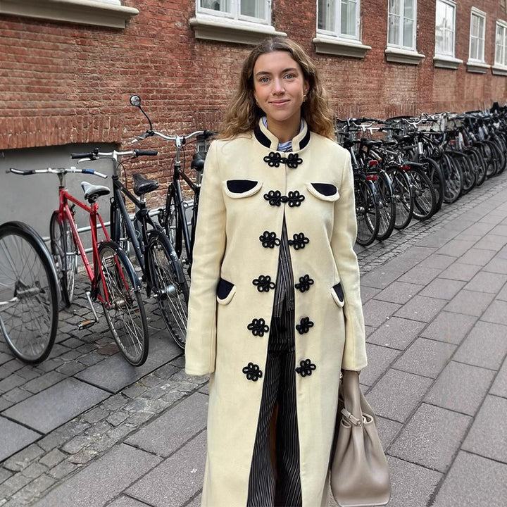 Women's maxi length tailored wool blend coat with stand-up collar and decorative frog closures Mune Fashion