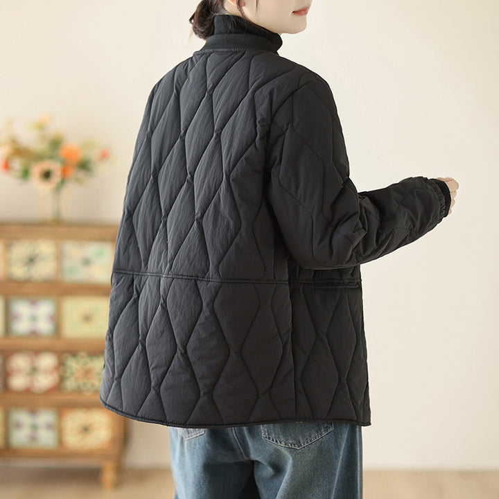 Women's lightweight padded transitional jacket with oversized cut, elastic sleeve cuffs and concealed snap button placket Mune Fashion
