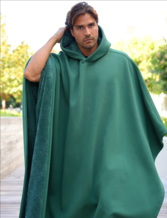 Unisex hooded poncho blanket with soft lining and generous oversized fit Mune Fashion
