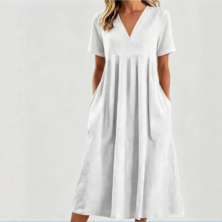 Women nan legeres V-neck midi dress with side pockets and gathered empire seam Mune Fashion