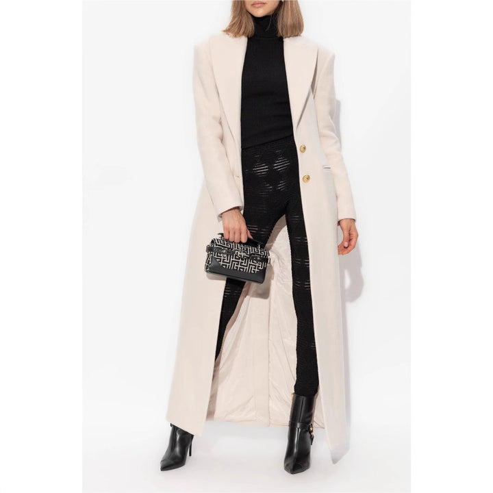 Women’s long-cut wool coat with tailored fit and golden buttons Mune Fashion