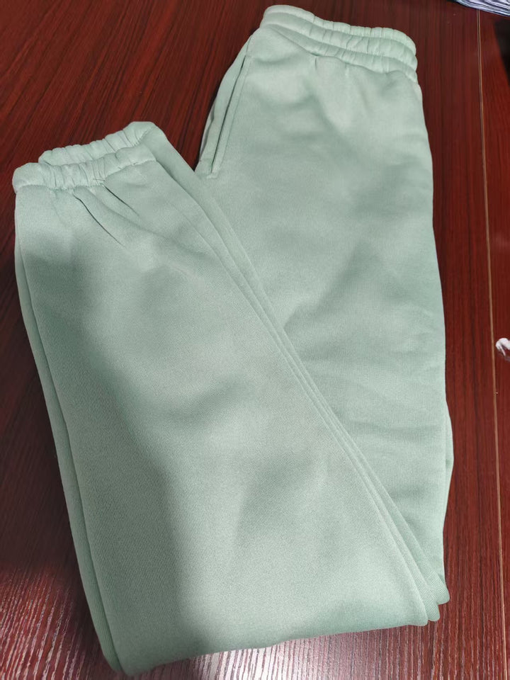 Women's casual sweatpants with high waistband, side pockets and elastic cuffs Mune Fashion