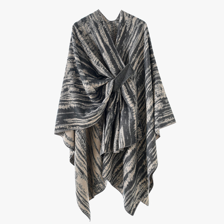 Ladies Jacquard cape cover-up with structured wave pattern, tie belt and asymmetrical hemline Mune Fashion
