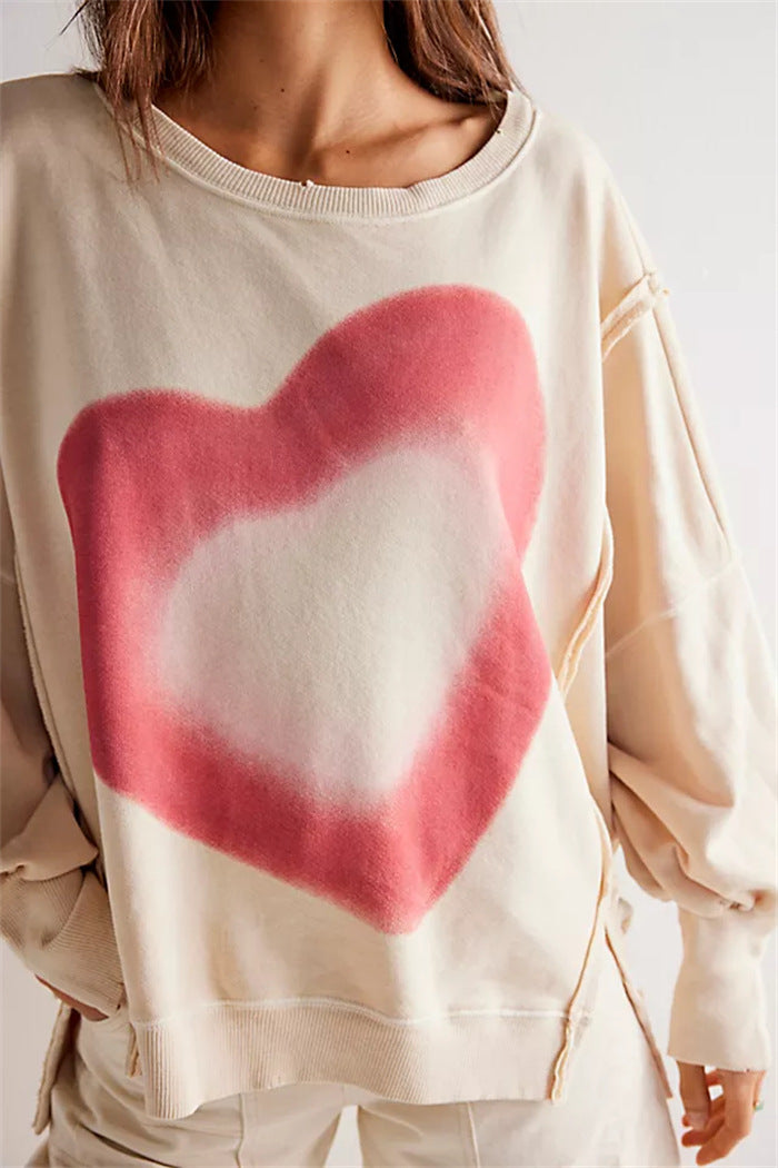 Women oversized sweatshirt with beet print, fringed seam accents and thumbhole sleeves Mune Fashion