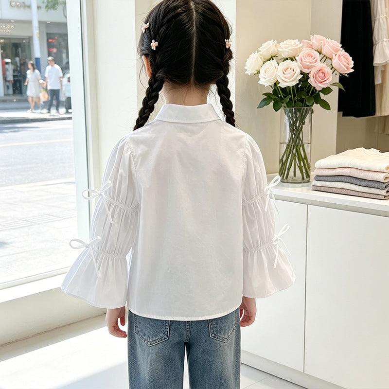 Girl's blouse with ruffle details and bow Mune Fashion