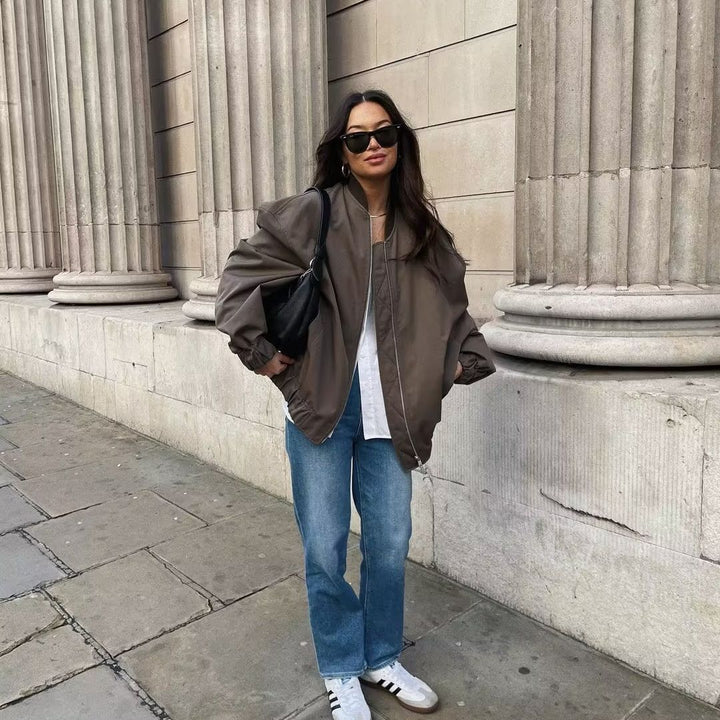 Unisex nan lighter oversized bomber jacket with continuous metal zipper, ribbed collar, and elastic hem Mune Fashion