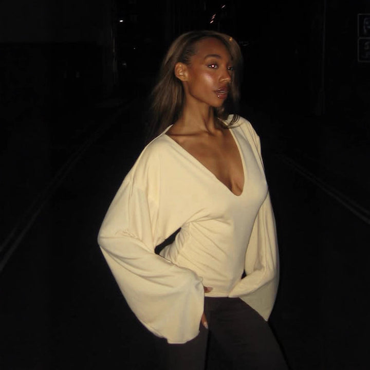 Women's tailored long sleeve cropped shirt with V-neck, dropped shoulder, and soft jersey quality Mune Fashion