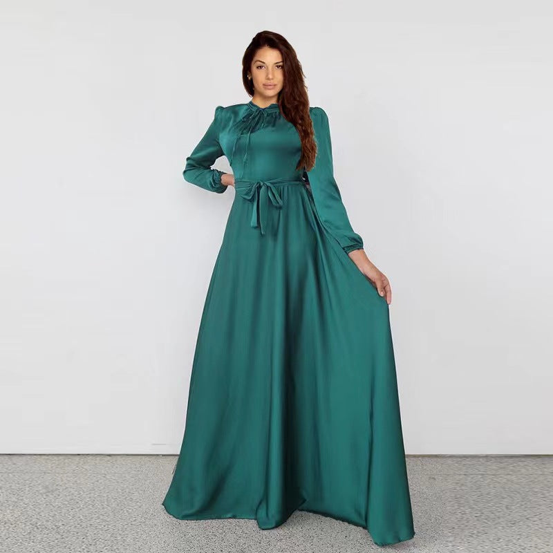 Women's maxi dress made of flowing satin with stand-up collar and tie belt Mune Fashion