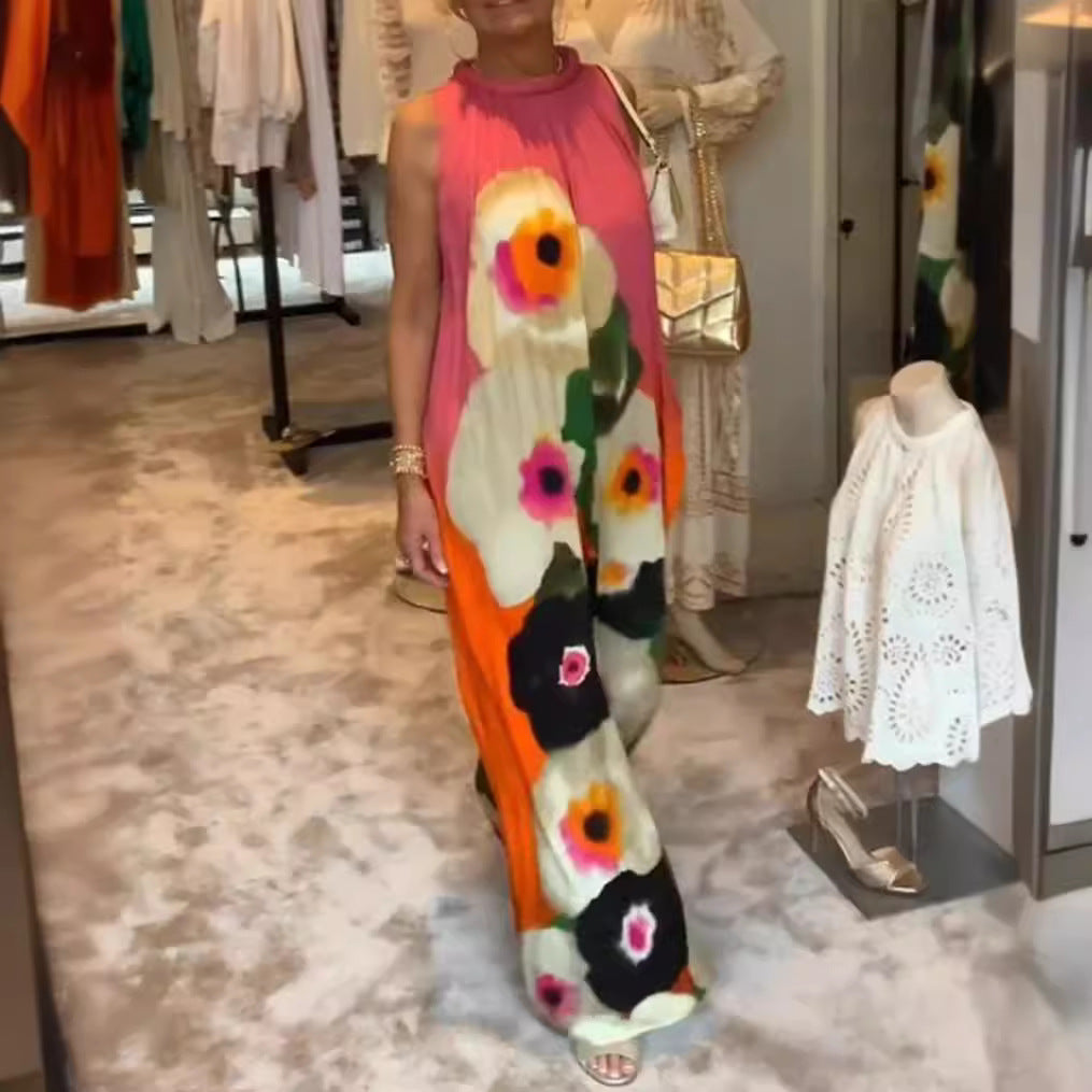 Women's sleeveless maxi dress with ruffled high collar, wide palazzo cut, and large floral print Mune Fashion