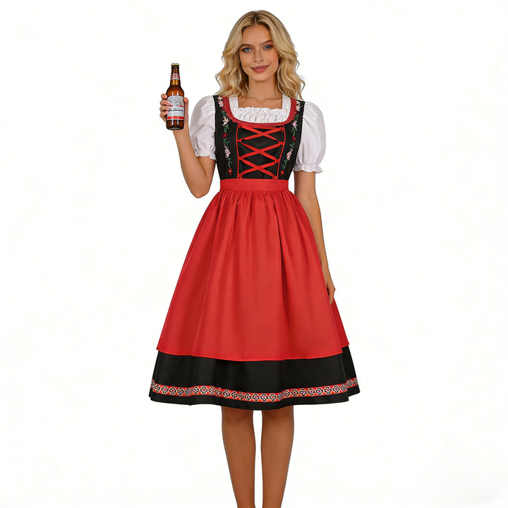 Ladies' traditional dirndl dress with embroidered bodice, puff sleeves, and apron Mune Fashion