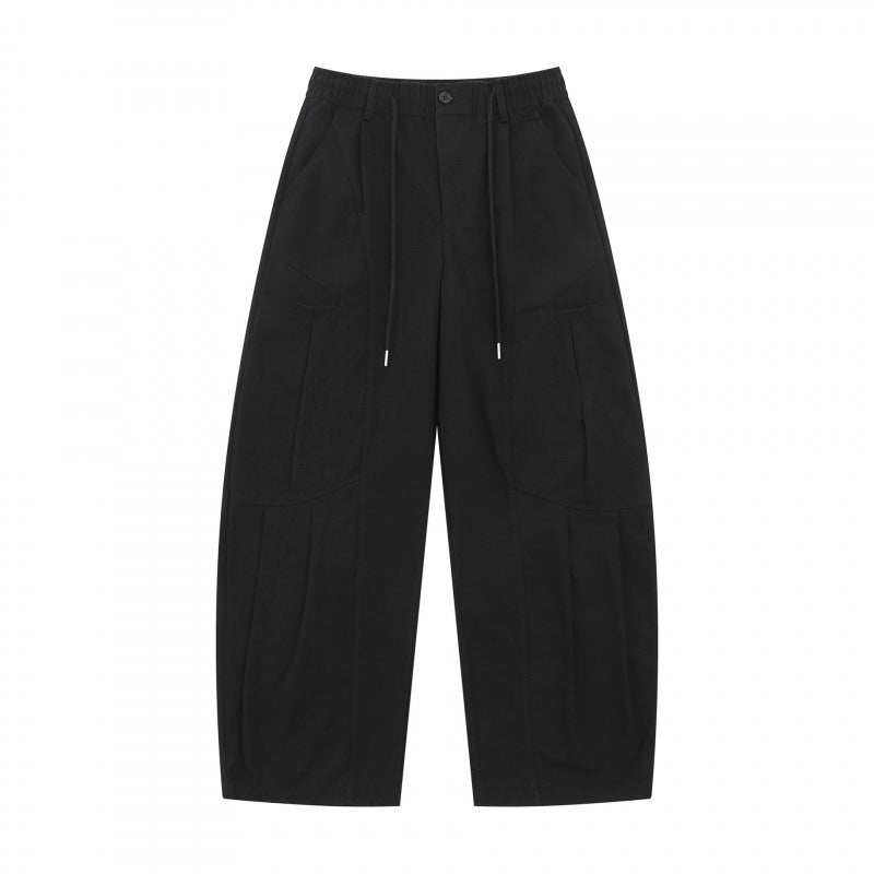 Unisex Wide Utility Cargo Pants made of cotton blend with drawstring waistband, large patch pockets, and balloon-shaped silhouette Mune Fashion