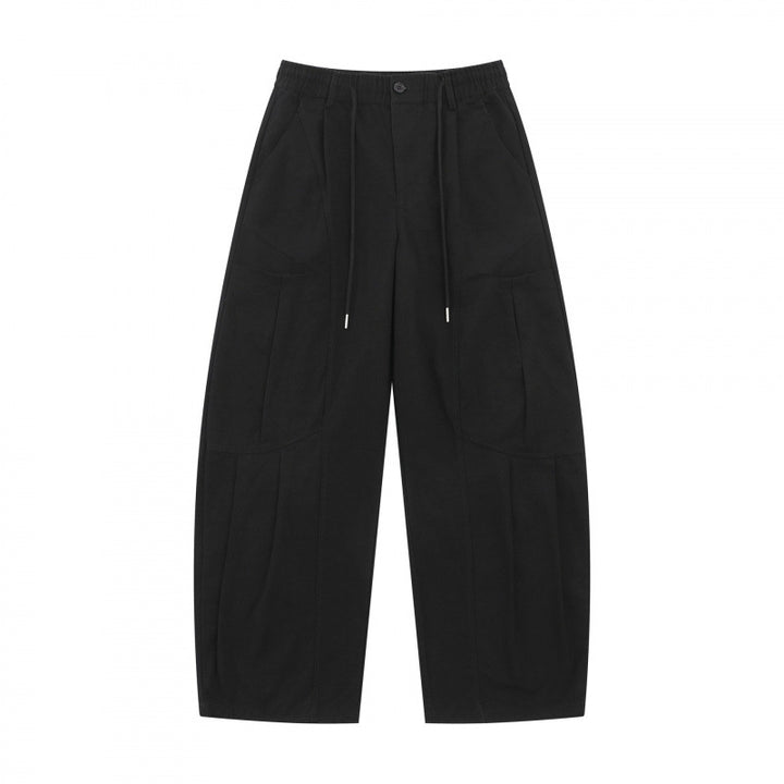 Unisex Wide Utility Cargo Pants made of cotton blend with drawstring waistband, large patch pockets, and balloon-shaped silhouette Mune Fashion