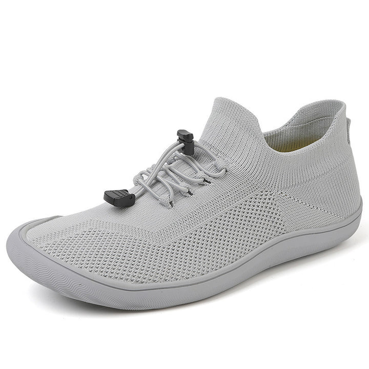Unisex slim-knit slip-on trainer with toggle lacing and ultra-flexible minimal sole Mune Fashion