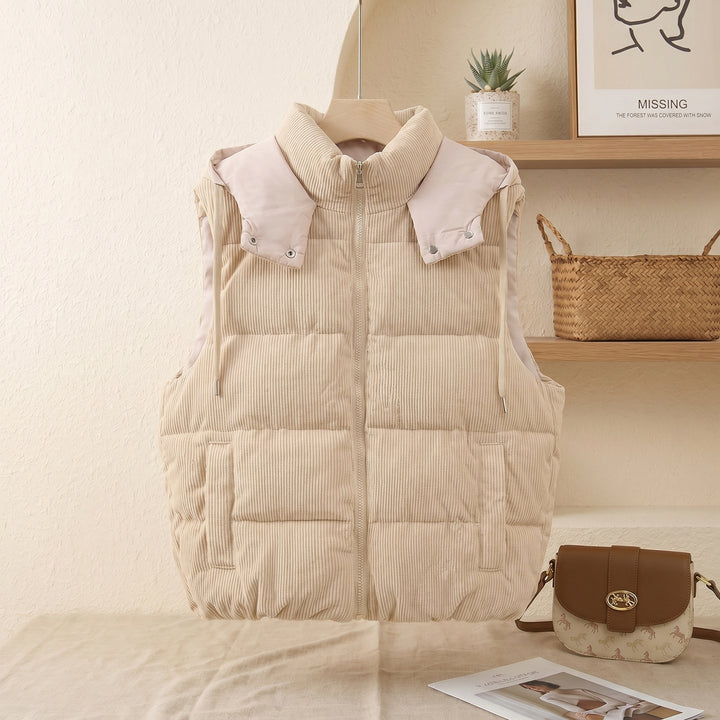 Ladies quilted cord vest with high shawl collar, padded insulation and detachable hood trim Mune Fashion