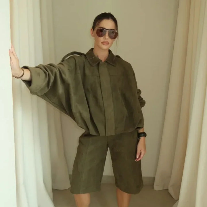 Women slightly oversized short jacket in suede look with lapel collar, shoulder flaps and elastic hem Mune Fashion