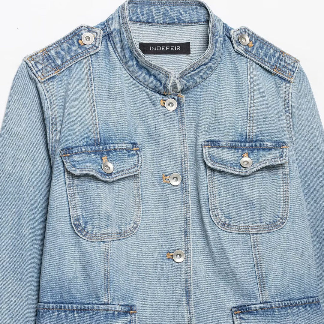 Women's jeans field jacket with stand-up collar, shoulder patches, and four flap pockets Mune Fashion