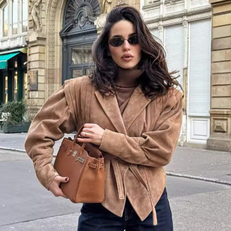 Women in tailored suede look blazer with wrap belt and gathered shoulders Mune Fashion