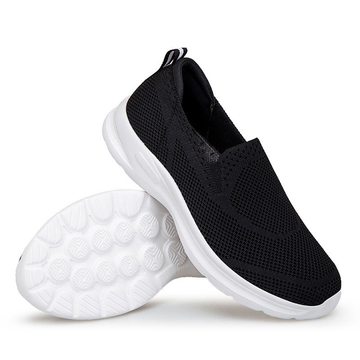 Women's slip-on knit trainer with sock-like shaft, pull tab, and responsive cushioning Mune Fashion