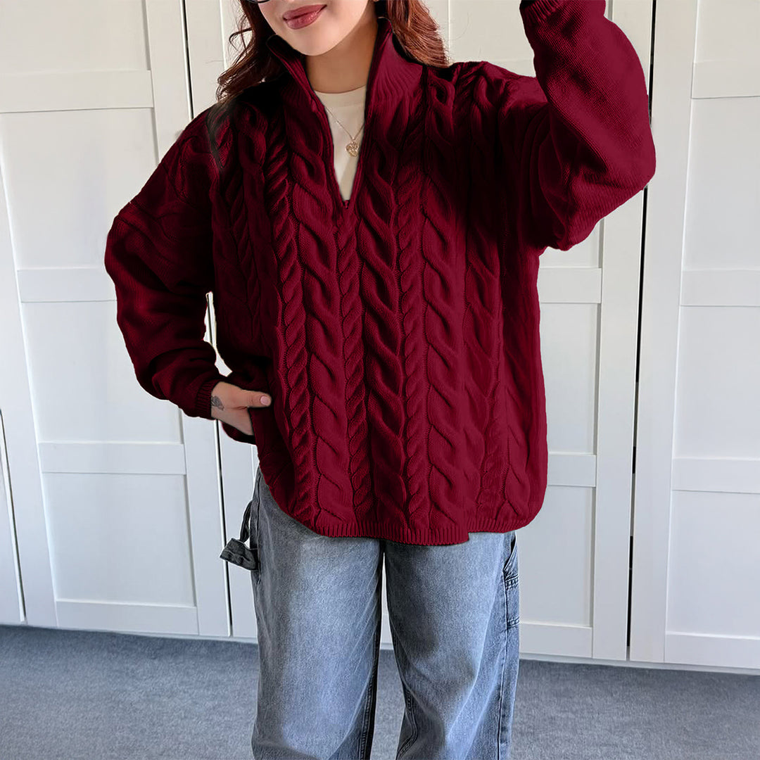 Women's oversized cable knit turtleneck sweater with half zip, high stand-up collar, and rounded hem Mune Fashion