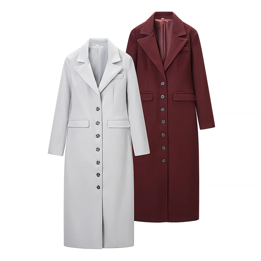 Women's figure-hugging knee-length coat with shawl collar, full button placket and flap pockets Mune Fashion