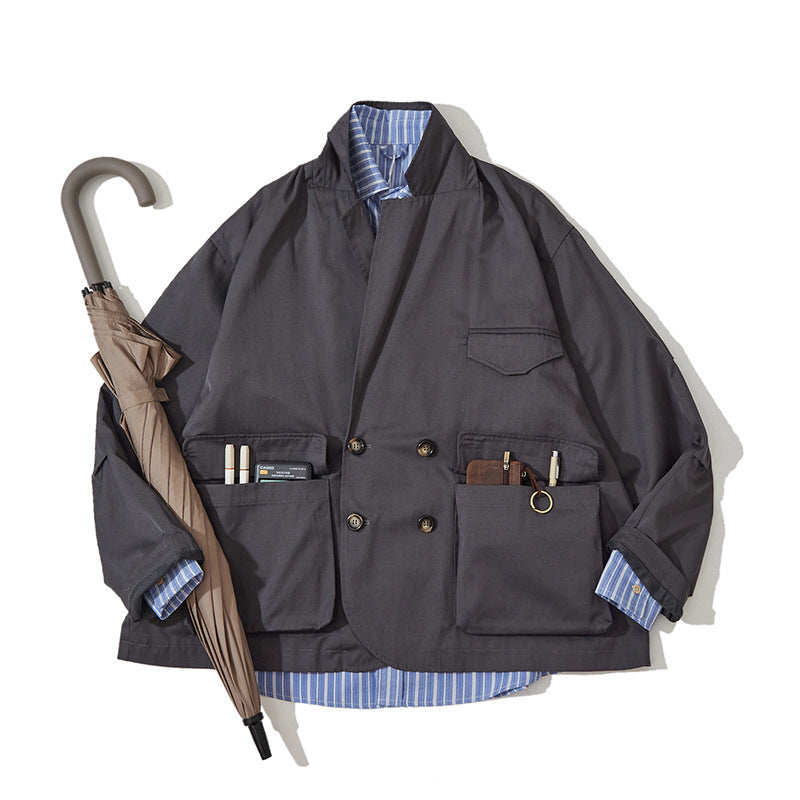 Unisex Boxy Overjacket with double-breasted button placket, large utility patch pockets and short boxy cut Mune Fashion