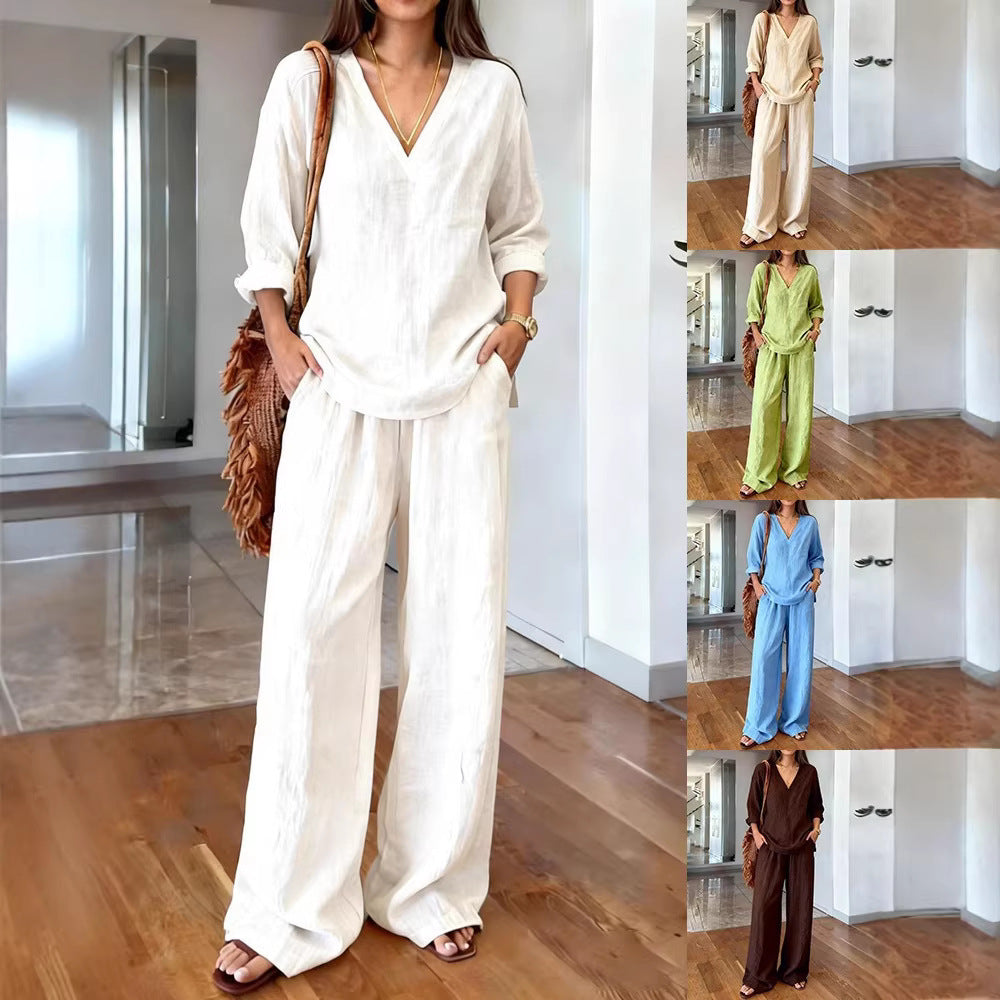 Women's lightweight linen look two-piece set with deep V-neck, loose 3/4 sleeves, and wide palazzo pants cut Mune Fashion