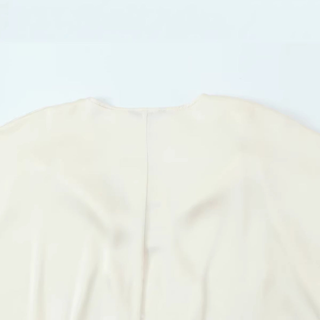 Women's satin blouse with deep wrap V-neck, elastic hem, and balloon sleeves Mune Fashion