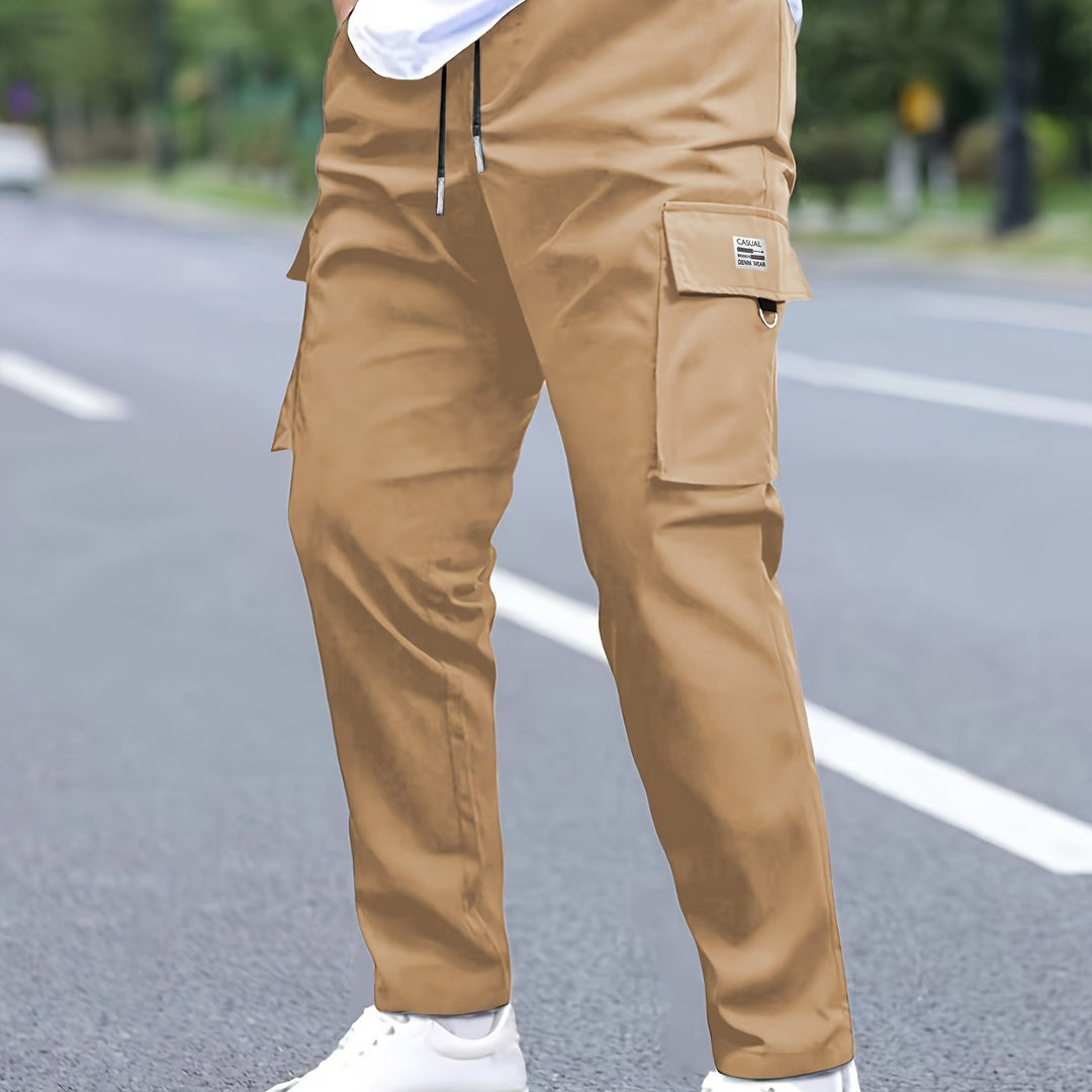 Men's tapered cargo pants in jogger style with drawstring, flap pockets & D-ring Mune Fashion