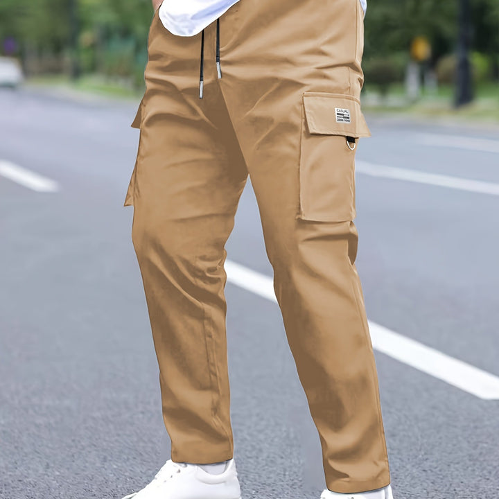 Men's tapered cargo pants in jogger style with drawstring, flap pockets & D-ring Mune Fashion