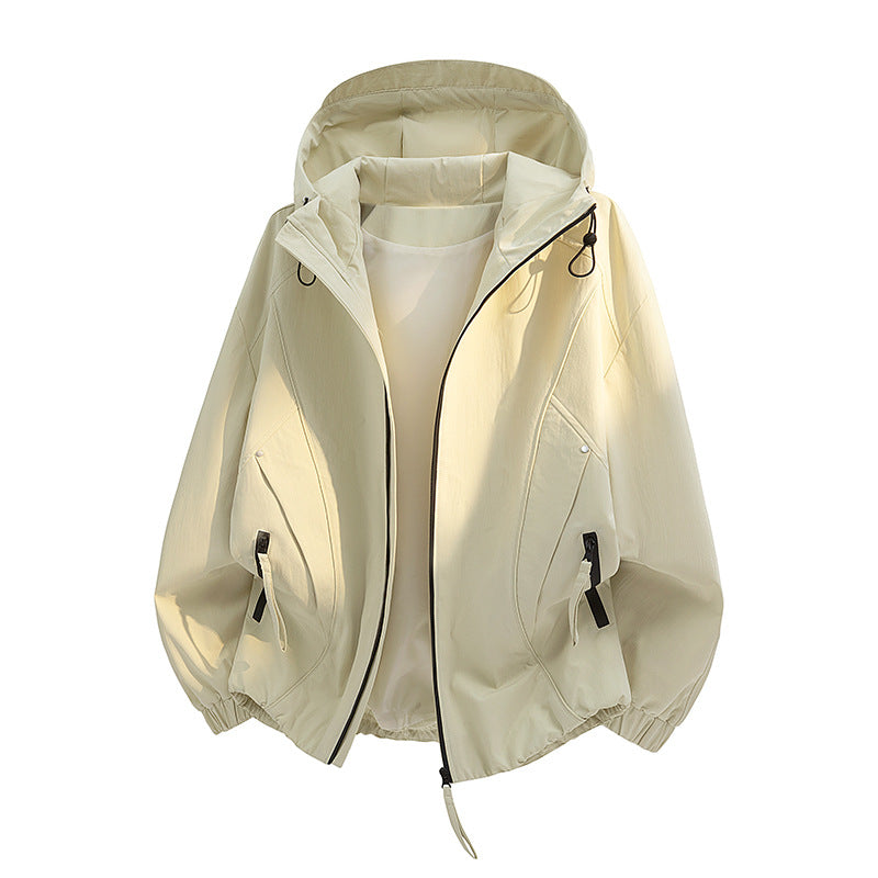 Women's lightweight hooded transitional jacket in oversized cut with elastic hem and concealed zipper pockets Mune Fashion