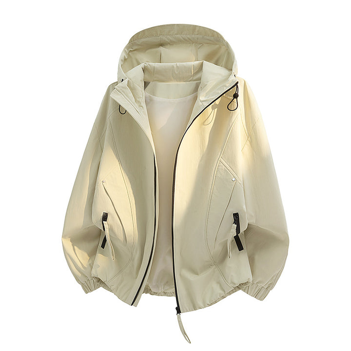 Women's lightweight hooded transitional jacket in oversized cut with elastic hem and concealed zipper pockets Mune Fashion