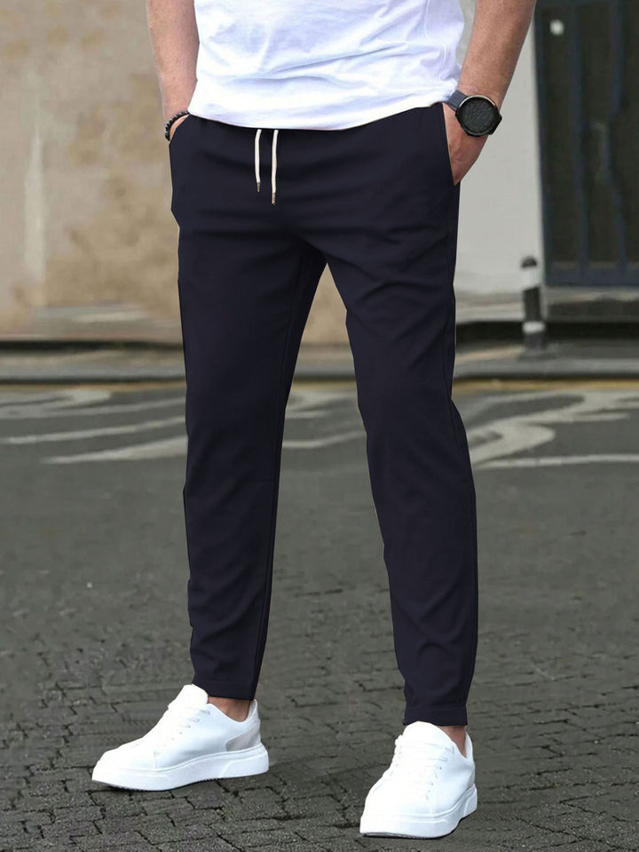 Men's Slim-Fit Jogging Pants with Drawstring, Side Pockets, and Narrow Ankle Hem Mune Fashion