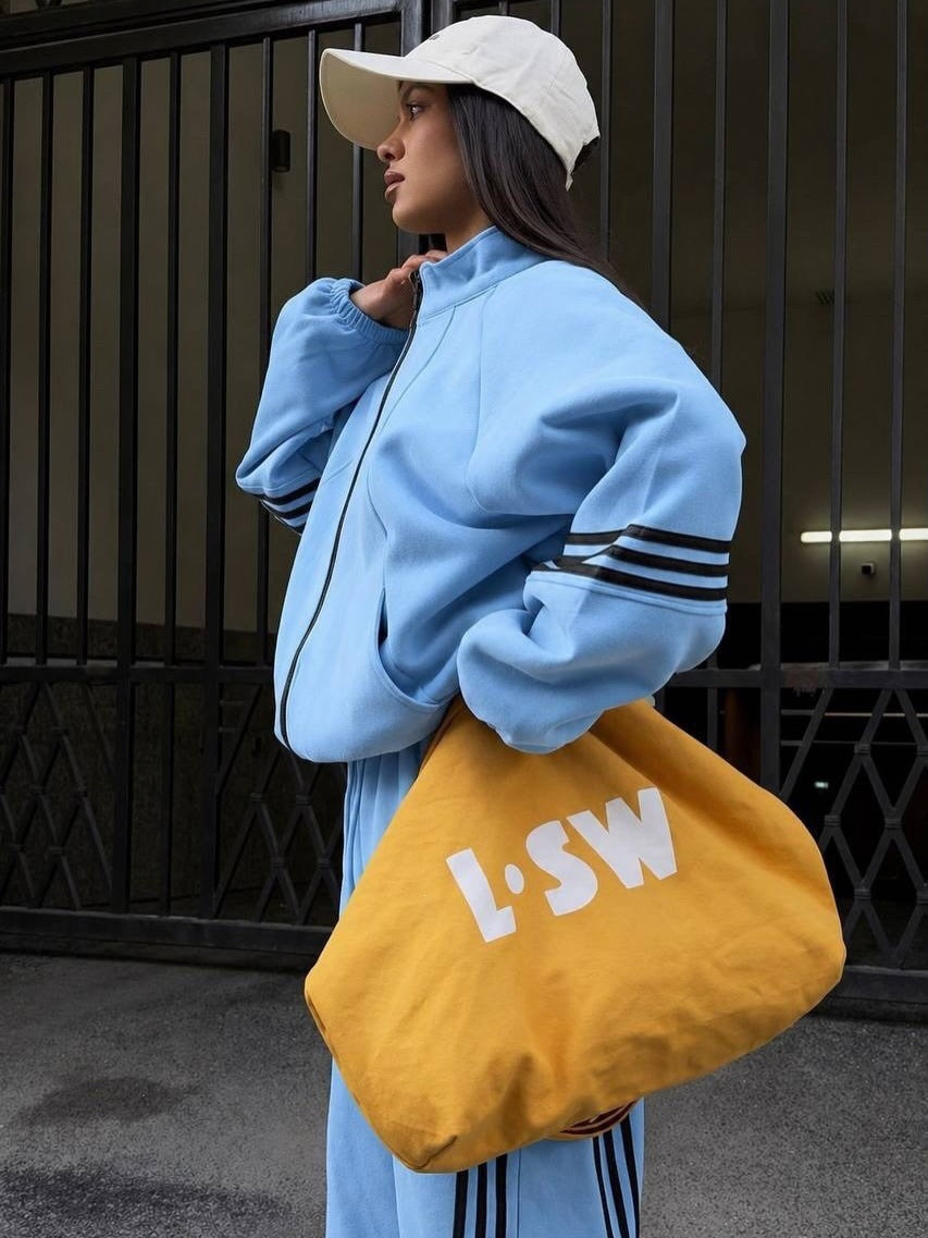 Women's wide jogging suit set made of cotton fleece with zipper and contrasting side stripes Mune Fashion