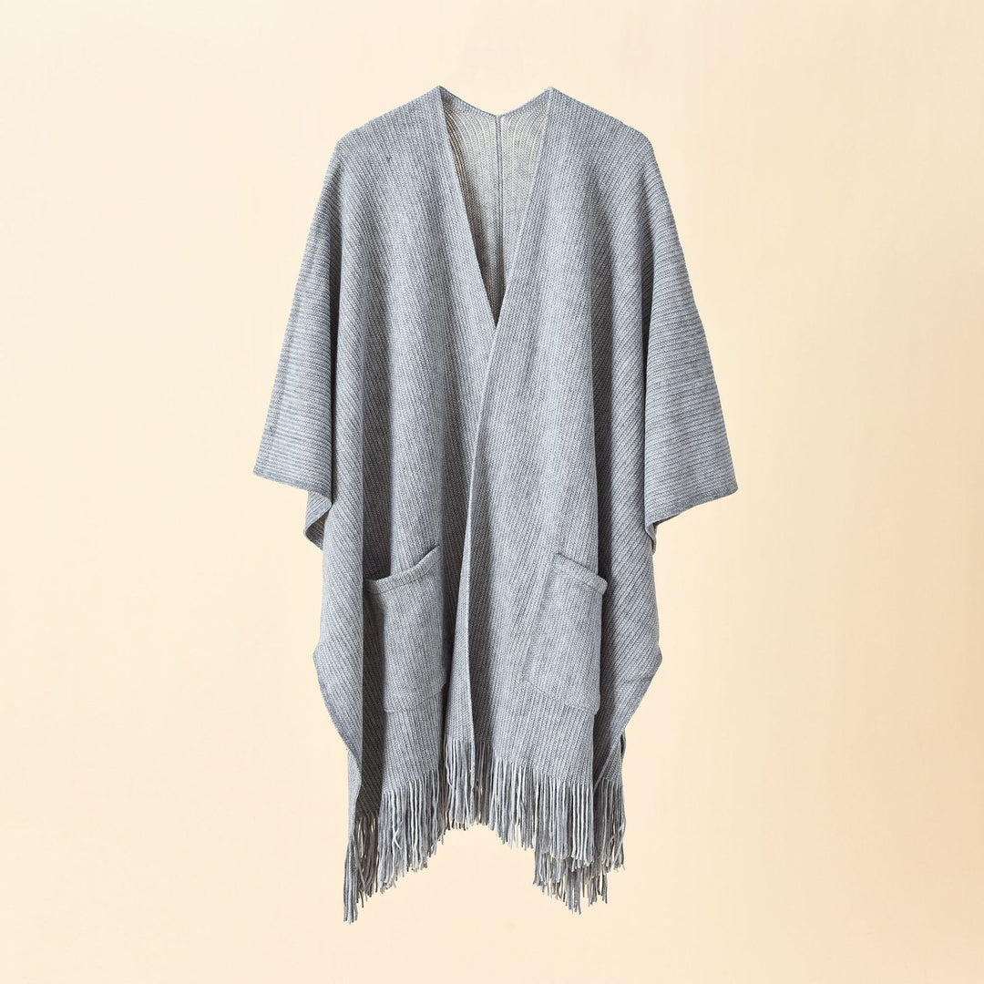 Women's chunky knit wrap with V-neck, patch pockets and fringes Mune Fashion
