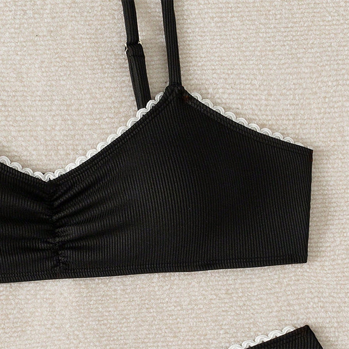 Women's bikini set with playful ruffle design and high-cut briefs Mune Fashion