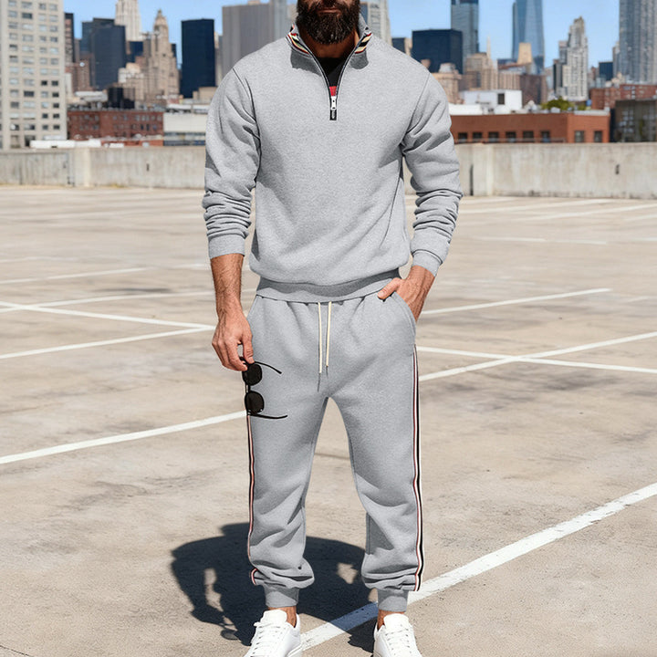 Men's stylish tracksuit set with half-zip, striped side stripes, and tapered jogger pants Mune Fashion