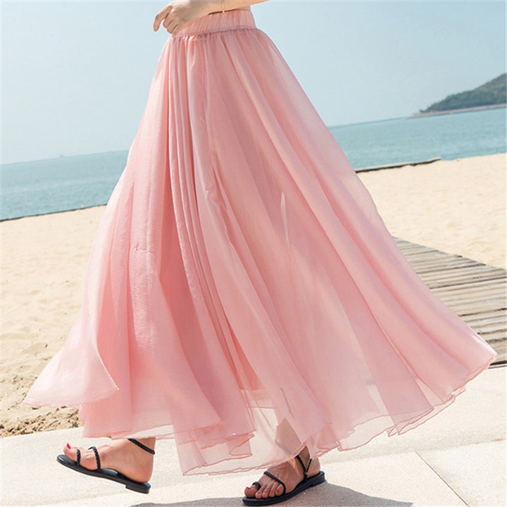 Women's flowing maxi skirt made of chiffon with elastic waistband and layered ruffle Mune Fashion