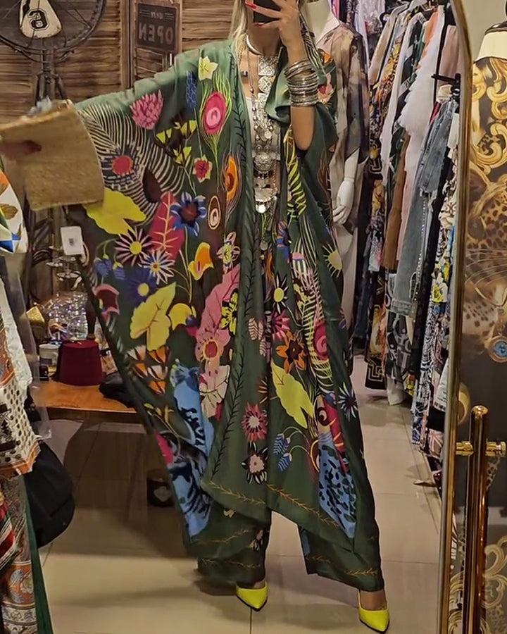 Women's extravagant maxi kaftan two-piece set with wide kimono sleeves, flared palazzo pants, and expressive floral print Mune Fashion