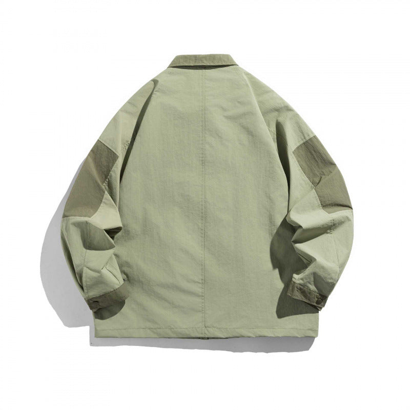Unisex Oversize Utility-Field Jacket with patch pockets, contrast panels, and hidden zip placket Mune Fashion
