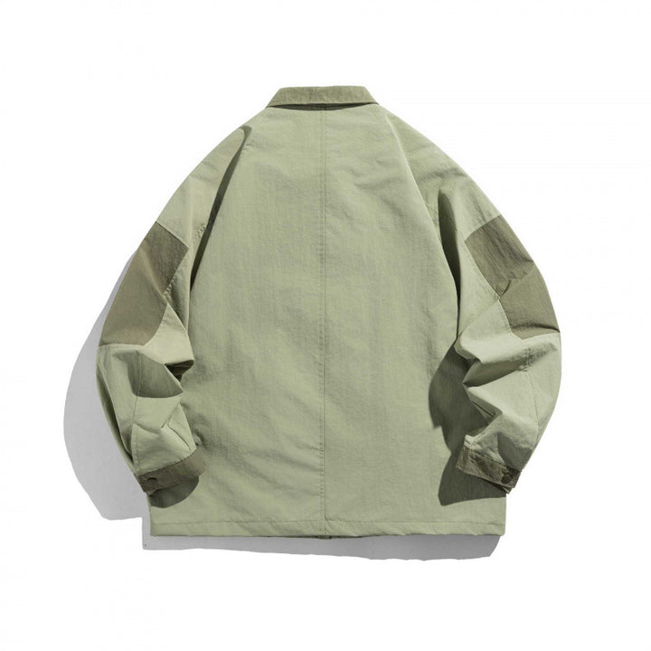 Unisex Oversize Utility-Field Jacket with patch pockets, contrast panels, and hidden zip placket Mune Fashion