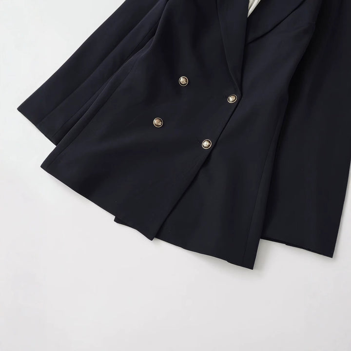 Ladies double-breasted long blazer with distinctive gold buttons and structured shoulder Mune Fashion