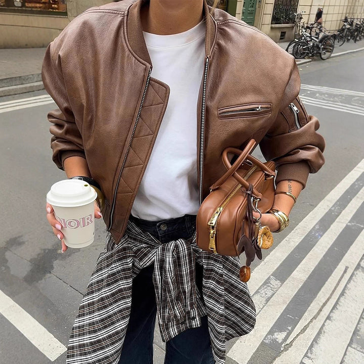 Women's Short Cut Faux Leather Bomber with Ribbed Collar, Zipper & Zip Chest Pocket Mune Fashion