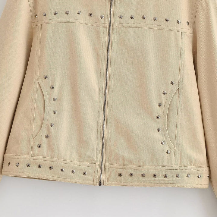 Women’s short-cut vegan leather jacket with stand-up collar, full-length zipper and star stud detail Mune Fashion